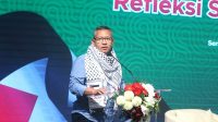 Rektor UII, Fathul Wahid saat menyampaikan sambutan pada seminar dan pameran lukisan di Kampus Terpadu UII Yogyakarta, Senin (7/10/2024). (foto : istimewa)